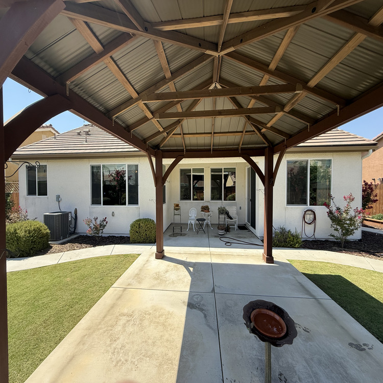 Concrete patio and walkway at a Clovis home