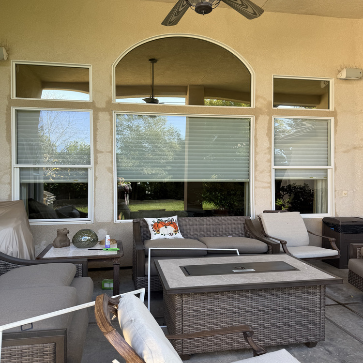 Upscale covered patio with the glass cleaned