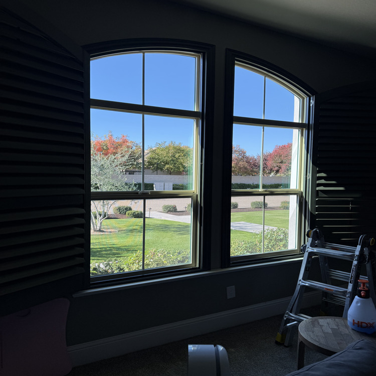 Tall arched windows cleaned inside and out